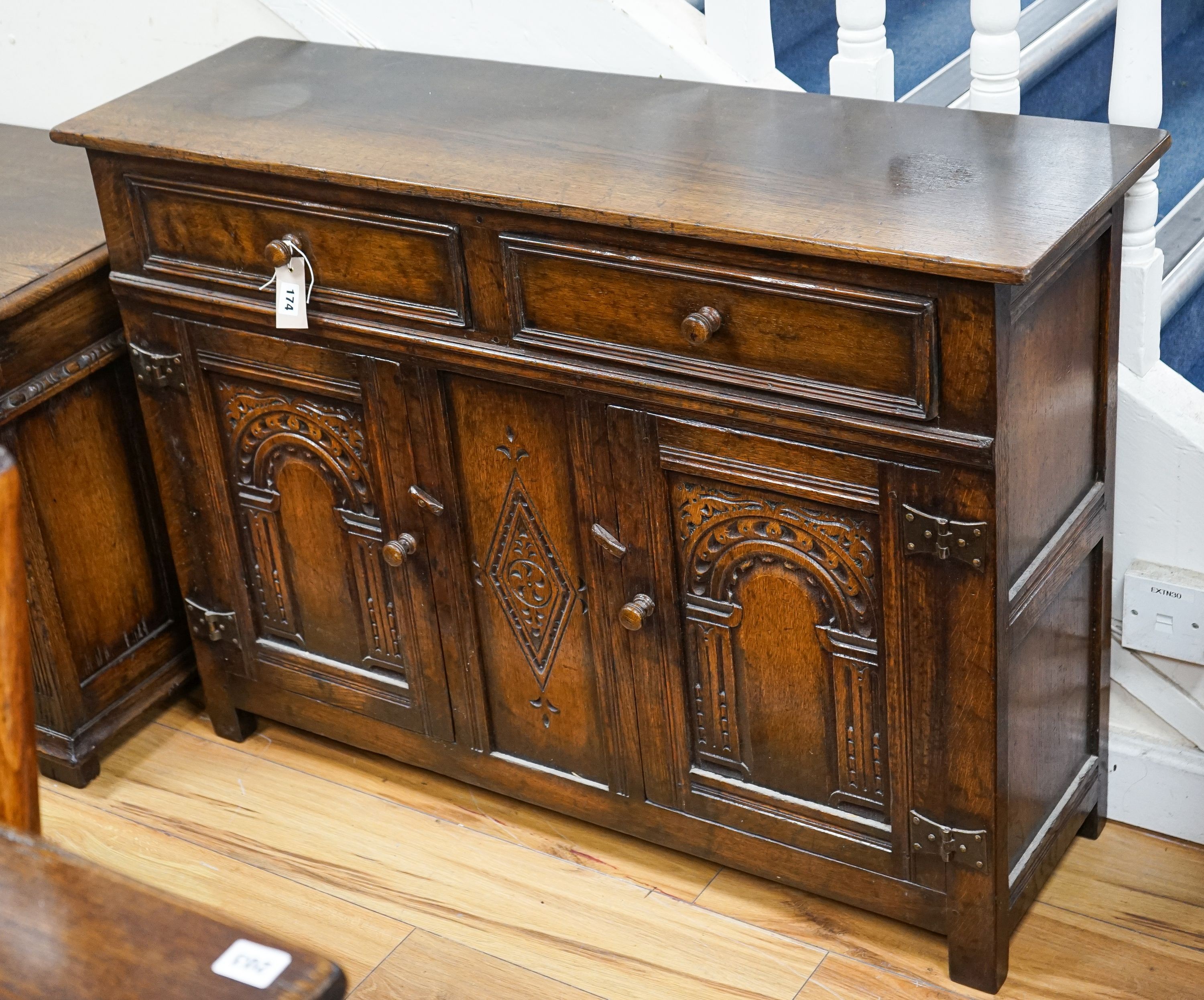 A Titchmarsh and Godwin oak side cabinet, width 107cm, depth 33cm, height 76cm